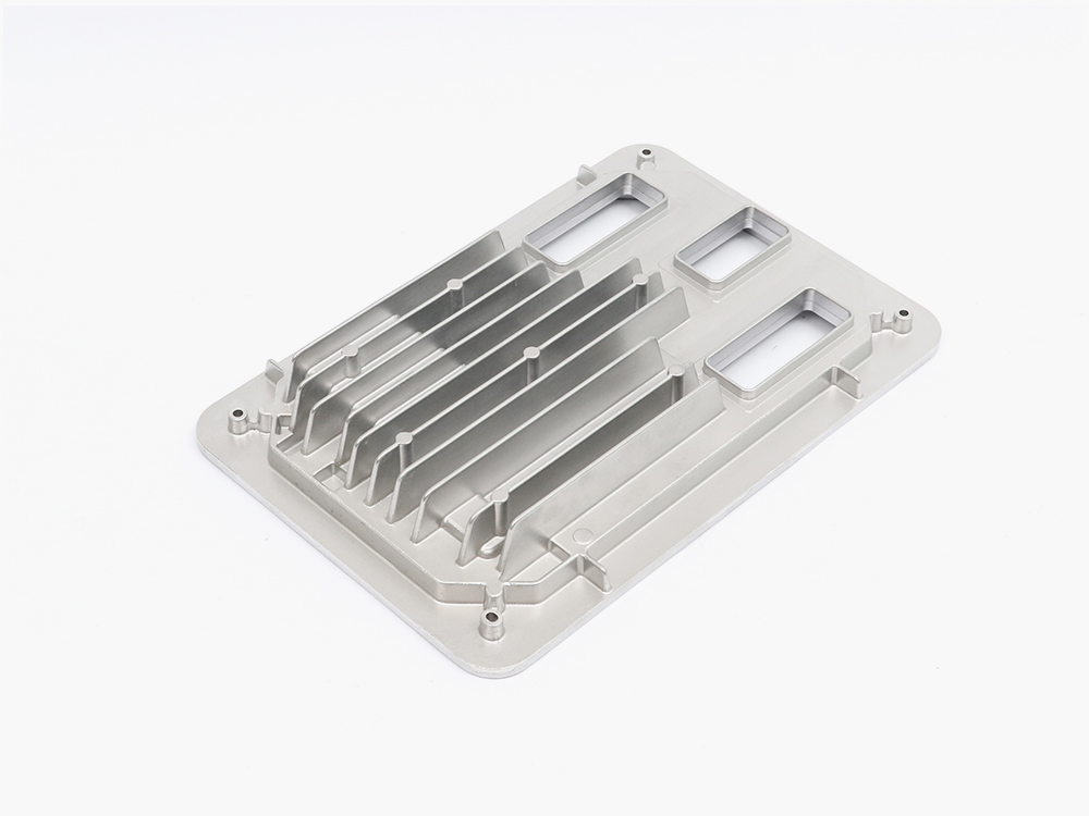 Aluminum die cast ECU housing with integrated heat dissipation fins and EMI shielding