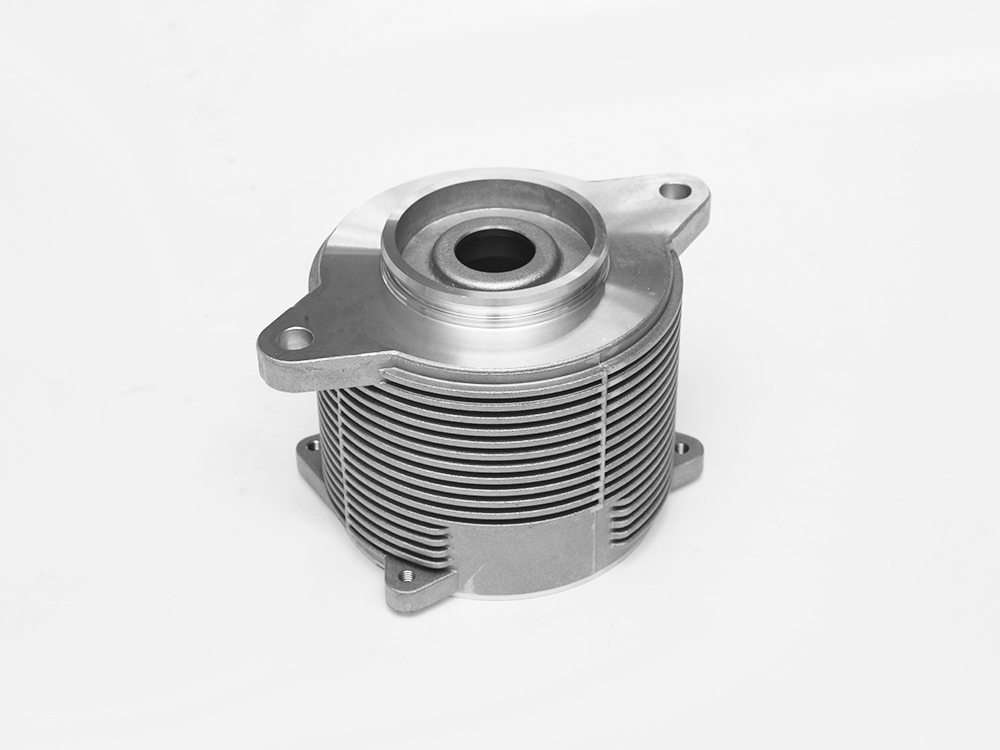 Aluminum die cast suspension valve body with precision cooling fins